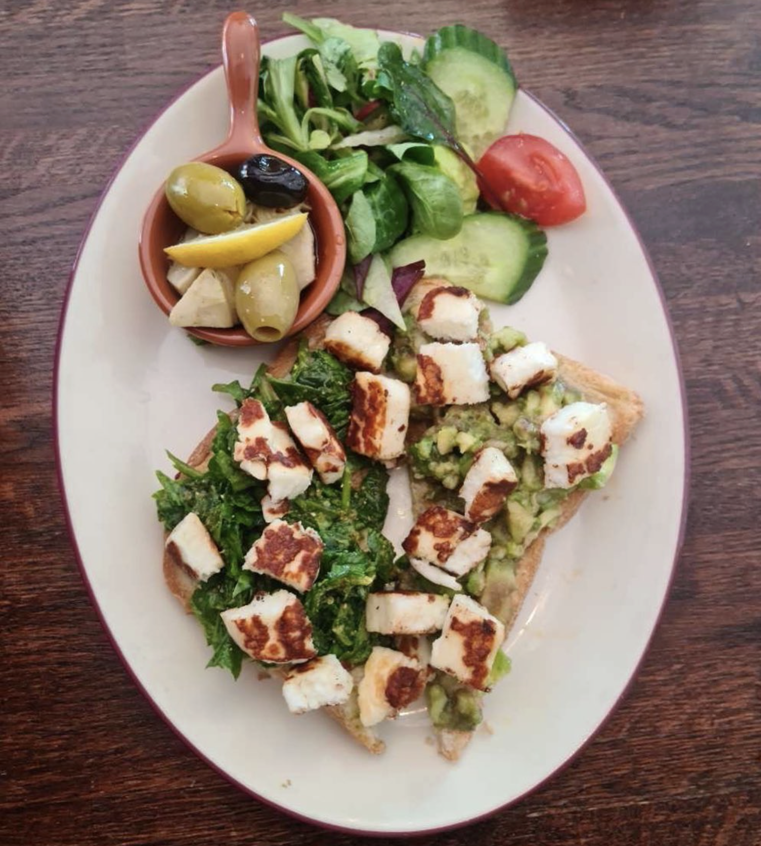 Avocado and halloumi on toast with olives